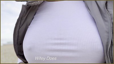 braless wife walks on the public beach